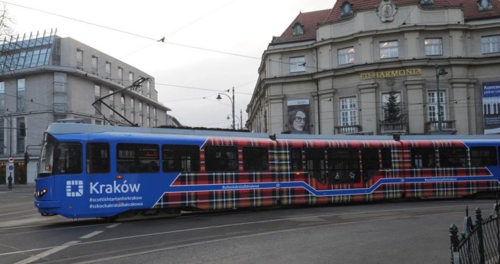 A tartan tram on the streets of Kraków